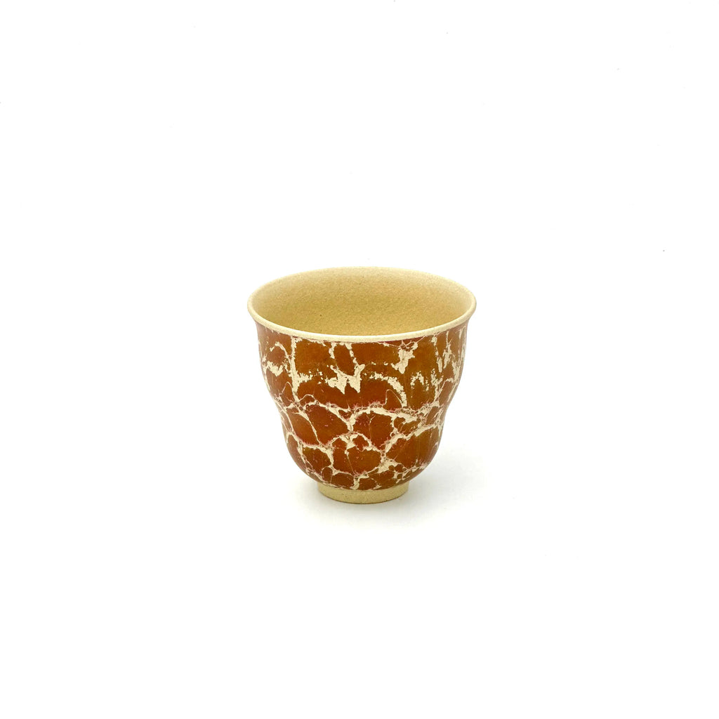 Angled front view of the 50ml Glazara Gilded Blossom teacup, highlighting its crafted inner rim and un-glazed interior perfect for tea tasting.