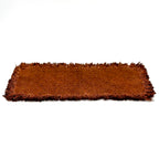 Brown rectangular tea mat with fringed edges on a white background