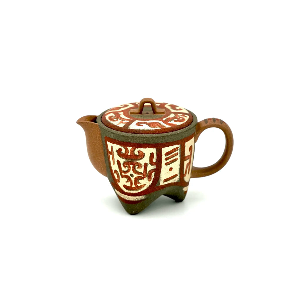 Front view of the Cloud & Thunder motif painted Yixing Zisha teapot, showcasing the ancient geometric Yunleiwen patterns on authentic purple clay.