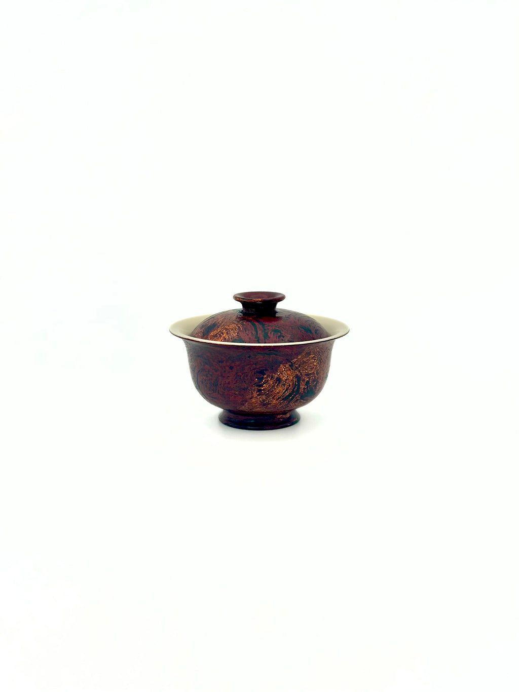 High angle shot showing the fitted lid and porcelain rim of the Crimson Eclipse small gaiwan.