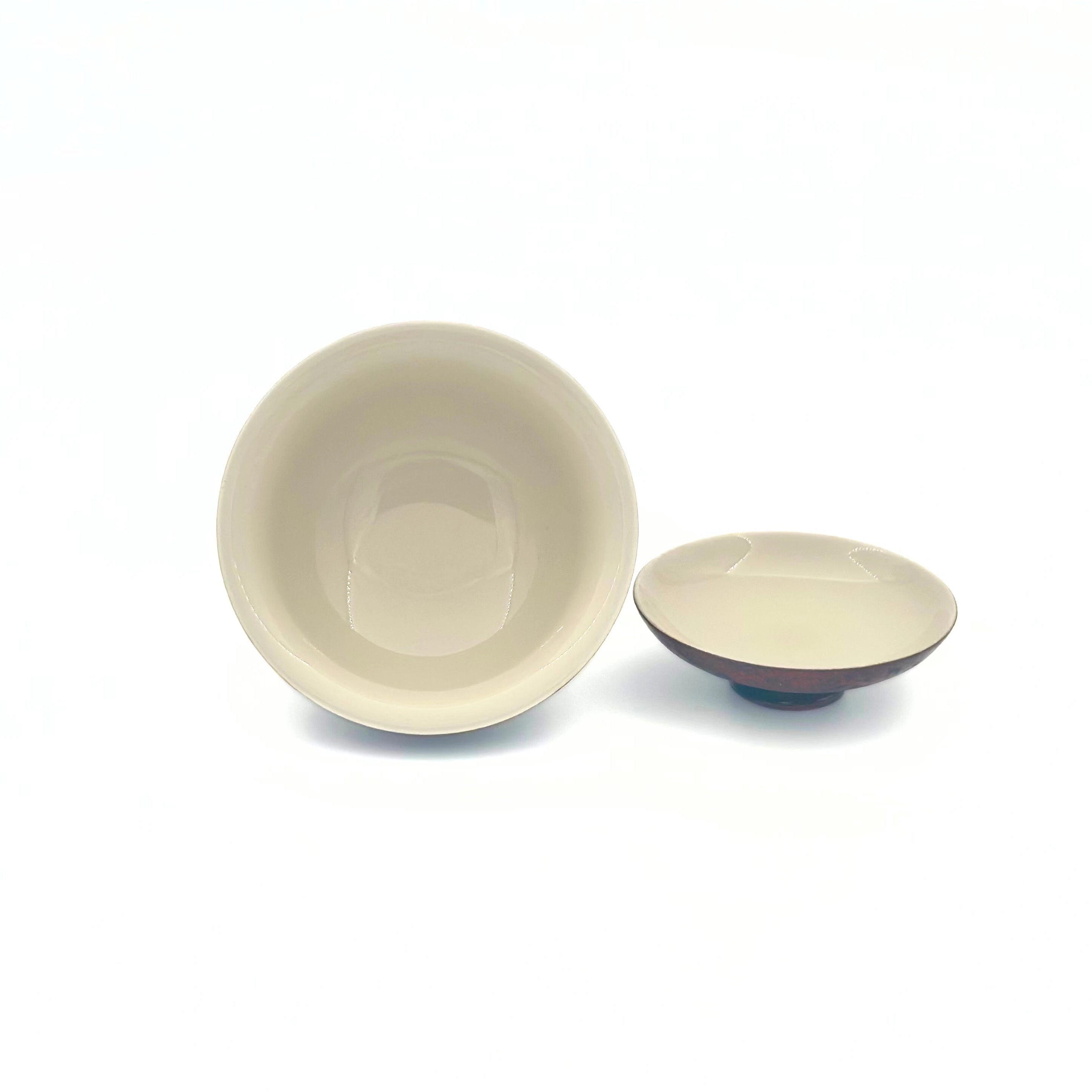 Open lid view showcasing the white porcelain interior glaze of the Crimson Eclipse tea vessel.