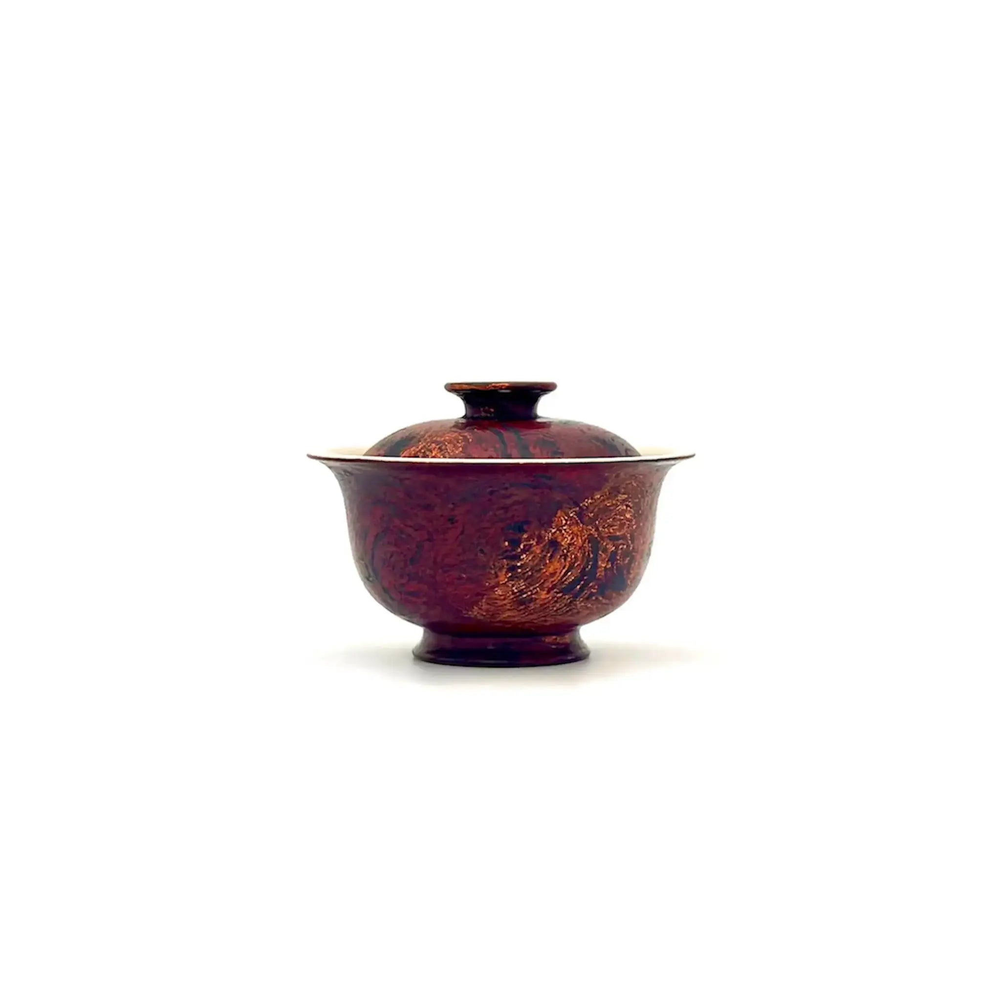 Ceramic teapot with lid on a white background