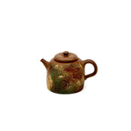 Front portrait view of the 100ml Desert Mirage hand-painted Yixing Zisha teapot, showcasing its rugged silhouette and artistic clay texture.