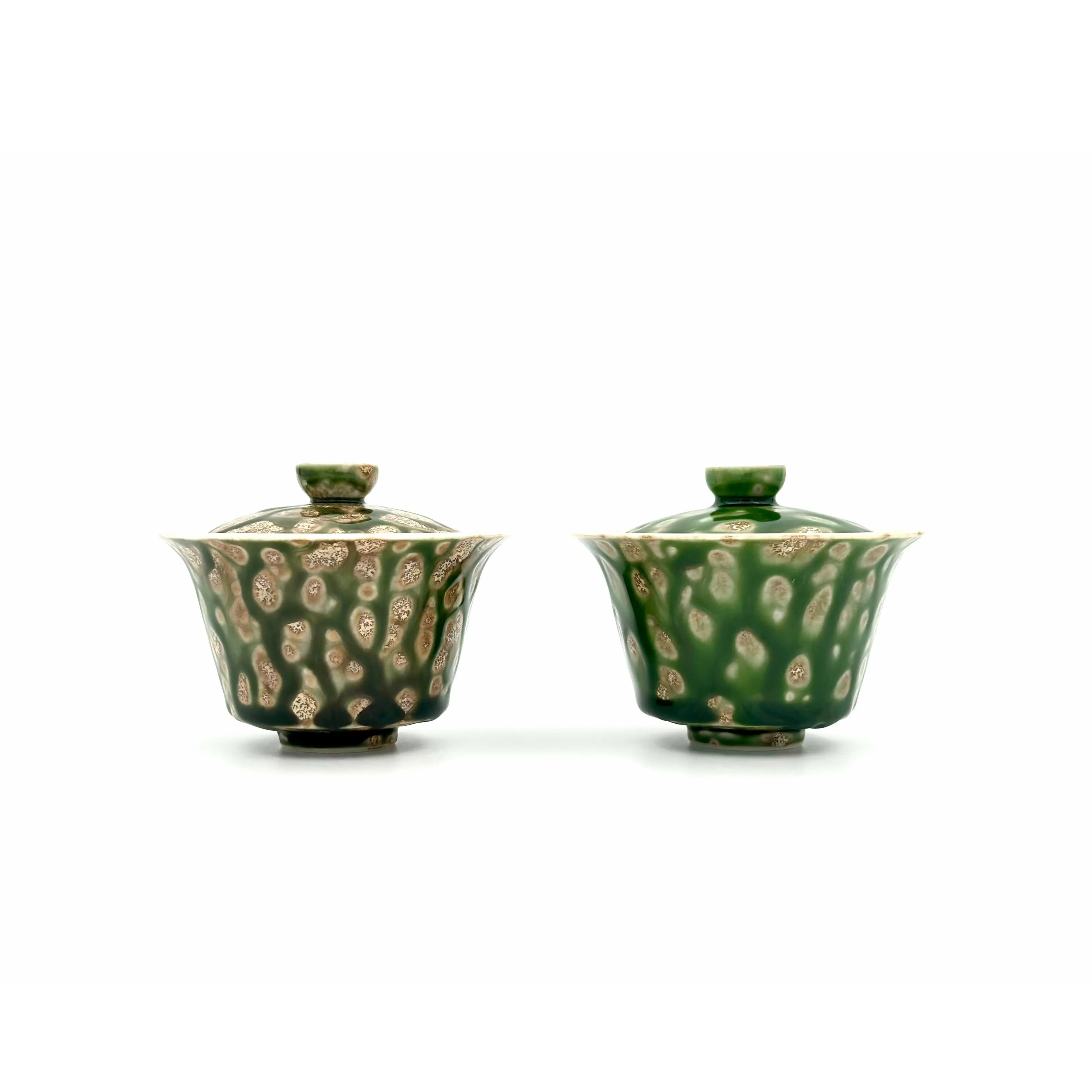 A side-by-side visual comparison of Glazara's Elemental Gaiwan green glaze variations, showcasing the unique and different bright finish of the Spring Willow and Forest Echo next to each other.