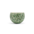 Front profile of the artisan Glazara Emerald Current ceramic matcha latte cup, featuring an elegant, wave-like green glaze crafted for the perfect home-café matcha experience.