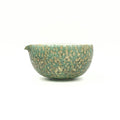 Front view of the hand-thrown Glazara Emerald Drift Matcha Bowl, showcasing its perfectly balanced chawan silhouette and the lush green, watercolor-like artisan glaze.