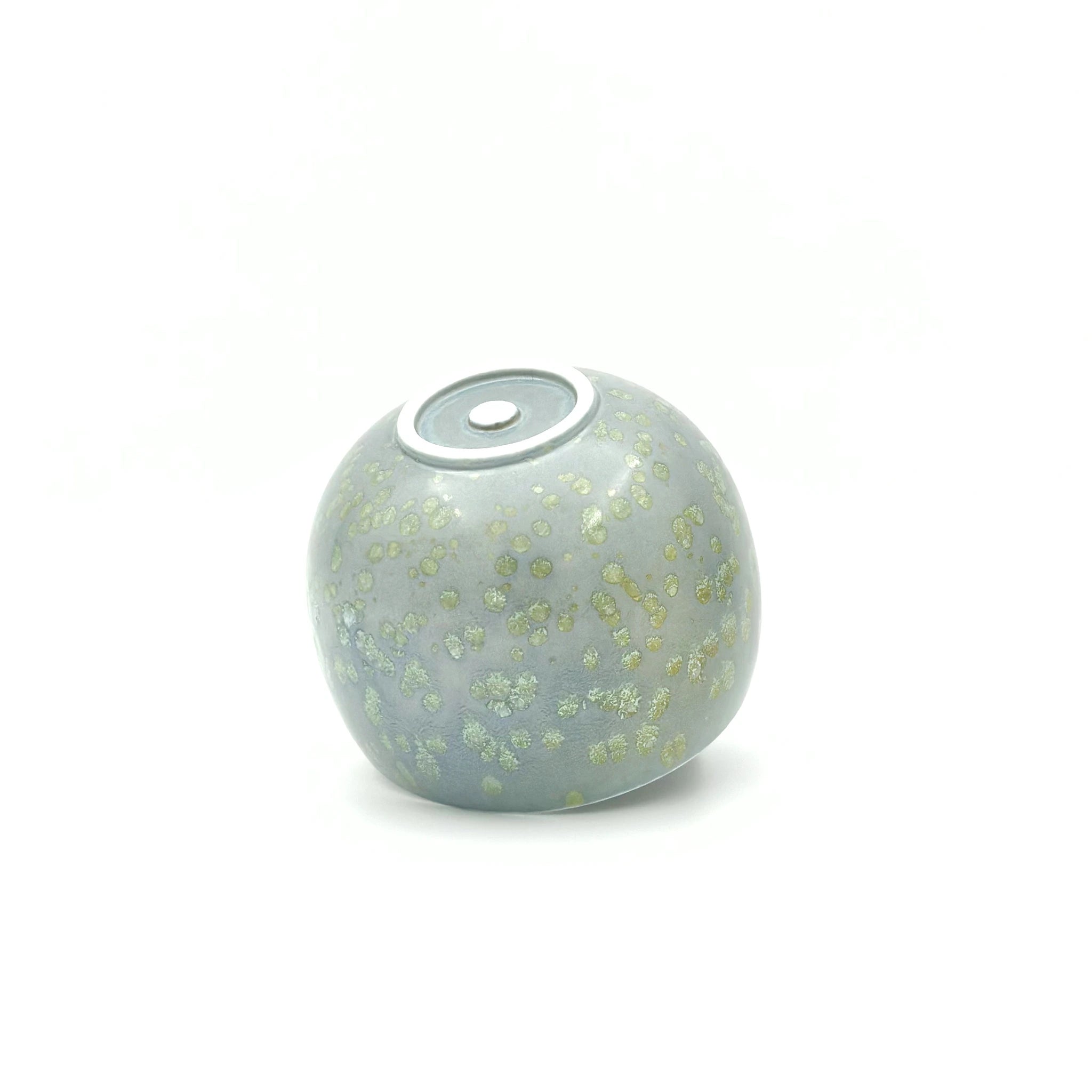 Close-up of the bottom maker's stamp and textured blue-grey impressionist glaze on the Glazara Giverny Ripple Matcha Latte Cup.
