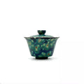 Front profile of the 100ml Midsummer Night Gaiwan featuring a deep, nocturnal glaze finish. Handcrafted porcelain vessel with a classic curve for ergonomic Gongfu brewing.