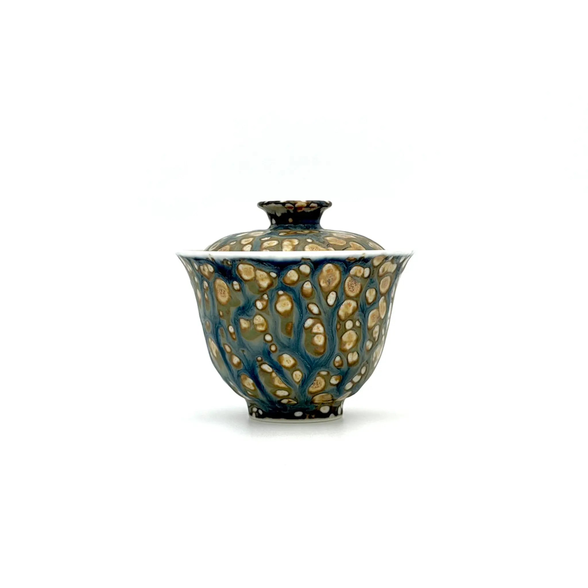 Porcelain gaiwan featuring a textured design on a white background