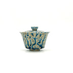 Front profile of the 100ml Ocean Vein Gaiwan featuring a fluid, oceanic glaze finish. Handcrafted porcelain vessel with a classic curve for ergonomic Gongfu brewing.