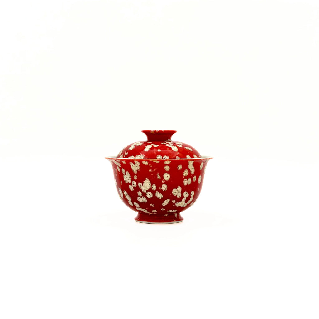 Front view of the Glazara Phoenix Spark Elemental Solo Gaiwan. This 70ml vessel features a compact silhouette and a fiery, iridescent red glaze, specifically designed for focused, individual tea brewing sessions.