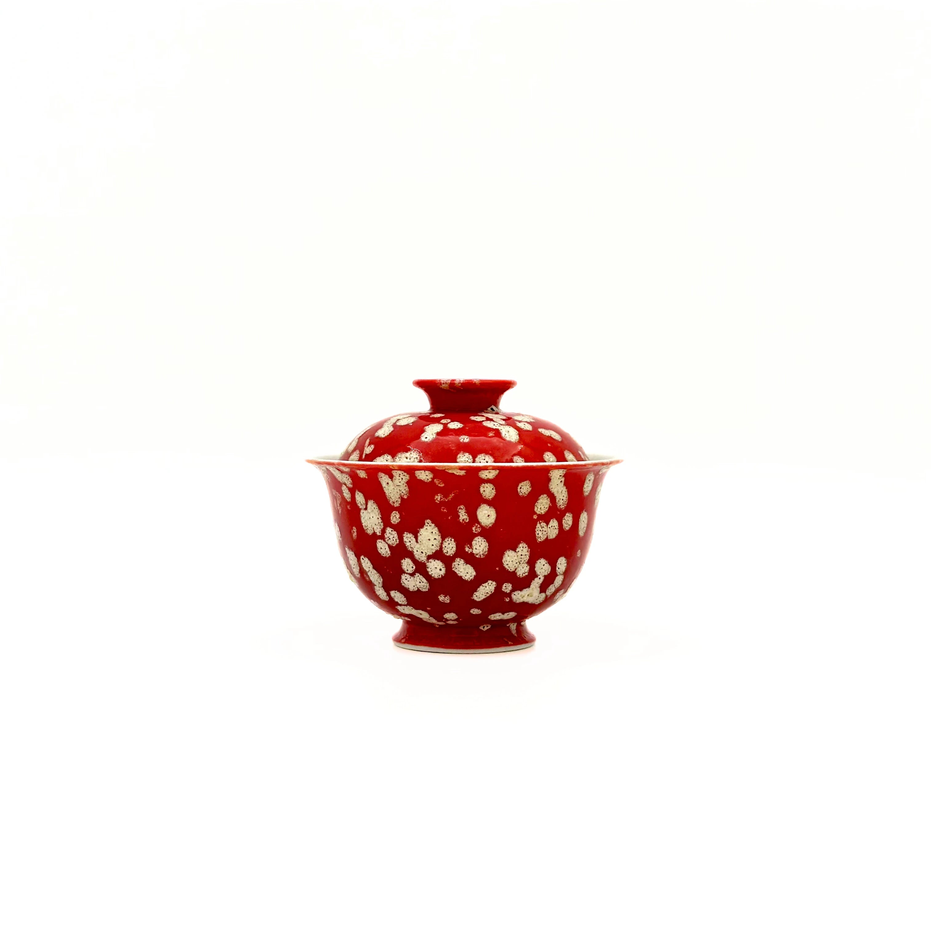 Front view of the Glazara Phoenix Spark Elemental Solo Gaiwan. This 70ml vessel features a compact silhouette and a fiery, iridescent red glaze, specifically designed for focused, individual tea brewing sessions.