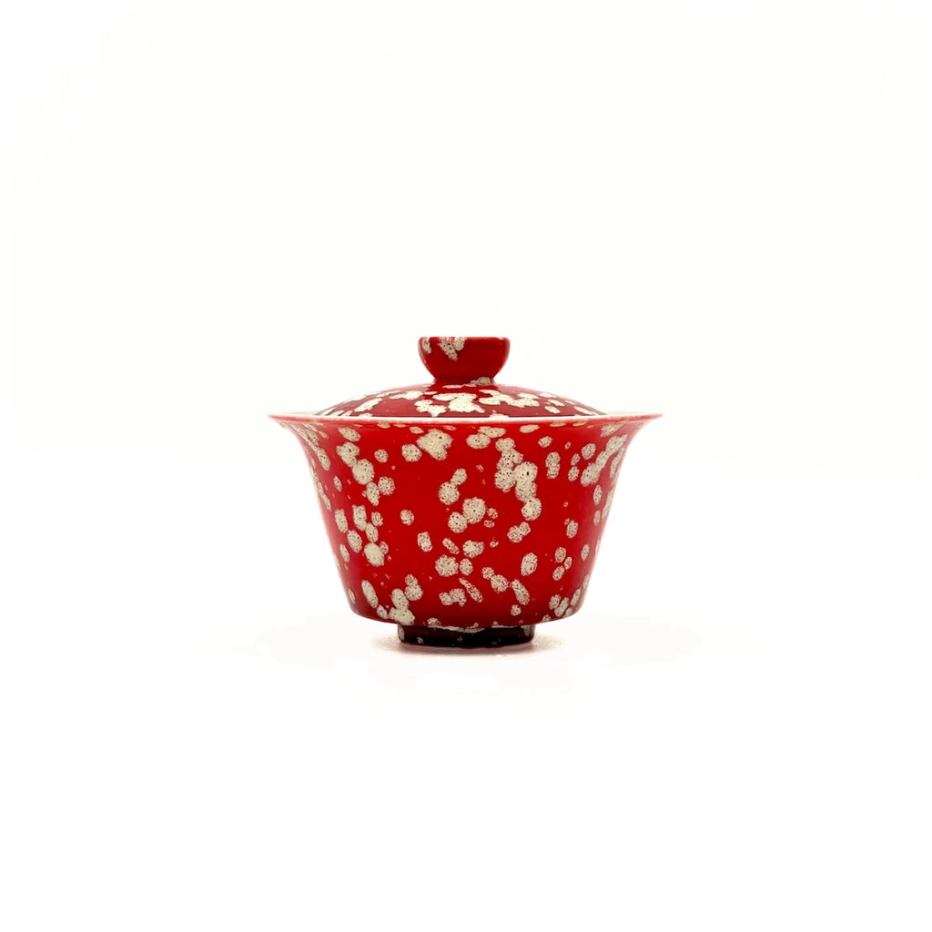 A formal front view of the 100ml Glazara Phoenix Spark Elemental Gaiwan. Displays the elegant silhouette and the vibrant, fire-inspired red and gold glaze tones of the Elemental series.