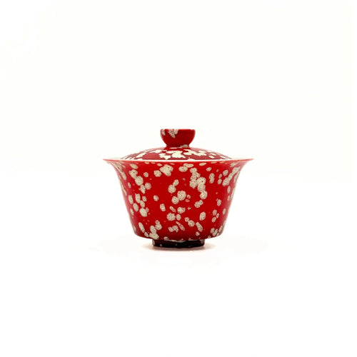 A formal front view of the 100ml Glazara Phoenix Spark Elemental Gaiwan. Displays the elegant silhouette and the vibrant, fire-inspired red and gold glaze tones of the Elemental series.