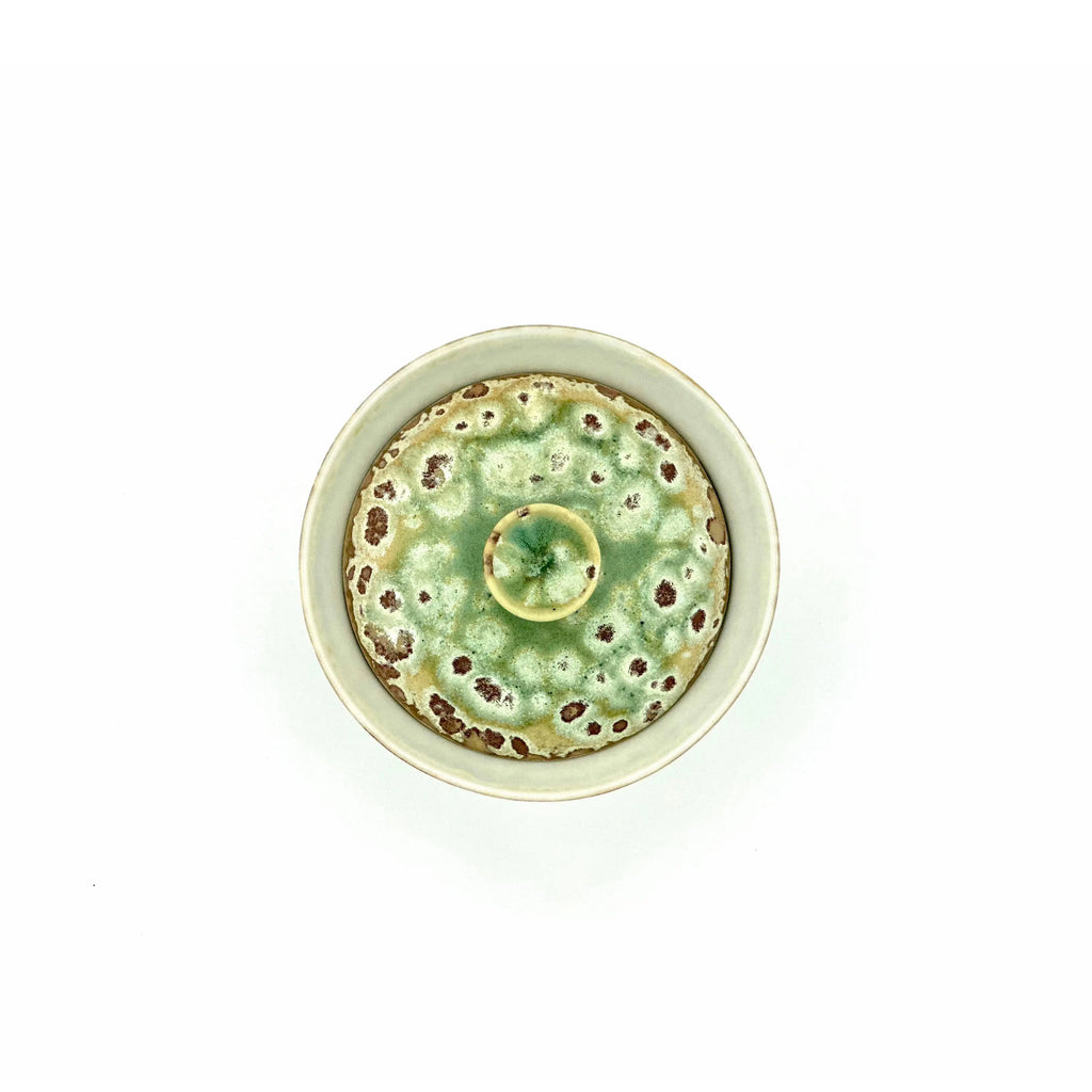 Overhead close-up of the 100ml Glazara Sage Vault Elemental Gaiwan, highlighting the perfectly fitted lid, ergonomic knob, and elegant, muted green glaze details.