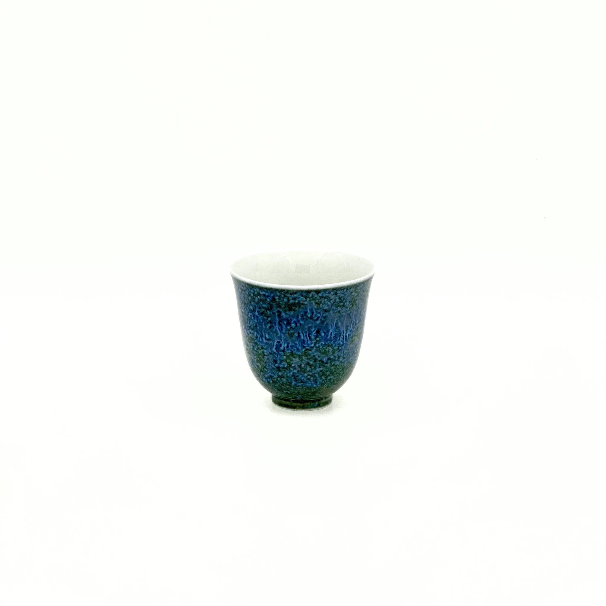 Front view of the 30ml Glazara Verdant Mirror tasting teacup, highlighting the carefully crafted inner rim and deep green exterior glaze.