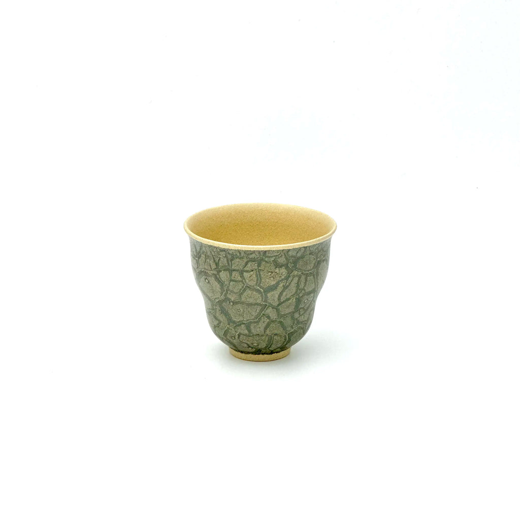 Angled top view showing the smooth inner rim and unique crackle finish of the 50ml Glazara Verdant Orchid Glacier Crackle teacup.