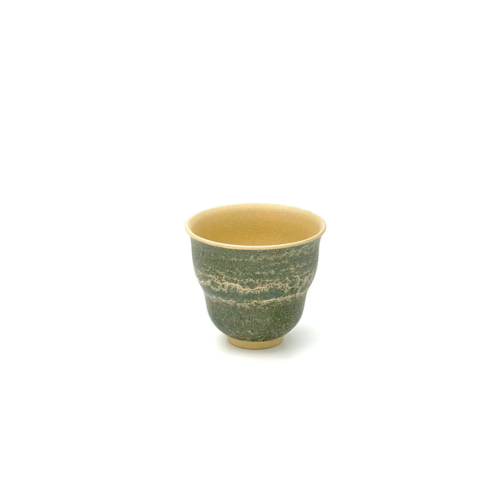 Angled front view highlighting the inner rim of the 50ml Glazara Verdant Orchid teacup in the earthy, handpainted Moss Dust design.