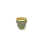 Tilted front view revealing the crafted inner rim and intricate interior glaze of the 50ml Glazara Verdant Orchid Shattered Ice teacup.