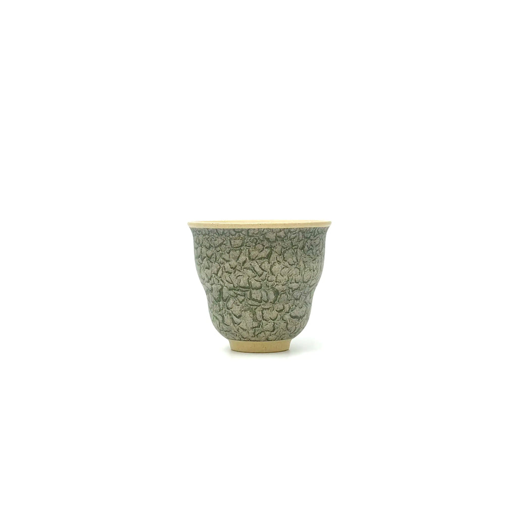 Front profile of the 50ml Glazara Verdant Orchid teacup, showcasing the striking handpainted Shattered Ice crazing pattern.