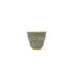 Front profile of the 50ml Glazara Verdant Orchid teacup, showcasing the striking handpainted Shattered Ice crazing pattern.