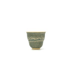 Front view of the 50ml Glazara Verdant Orchid teacup, featuring the handpainted Moss Dust pattern with fine, speckled glaze details.