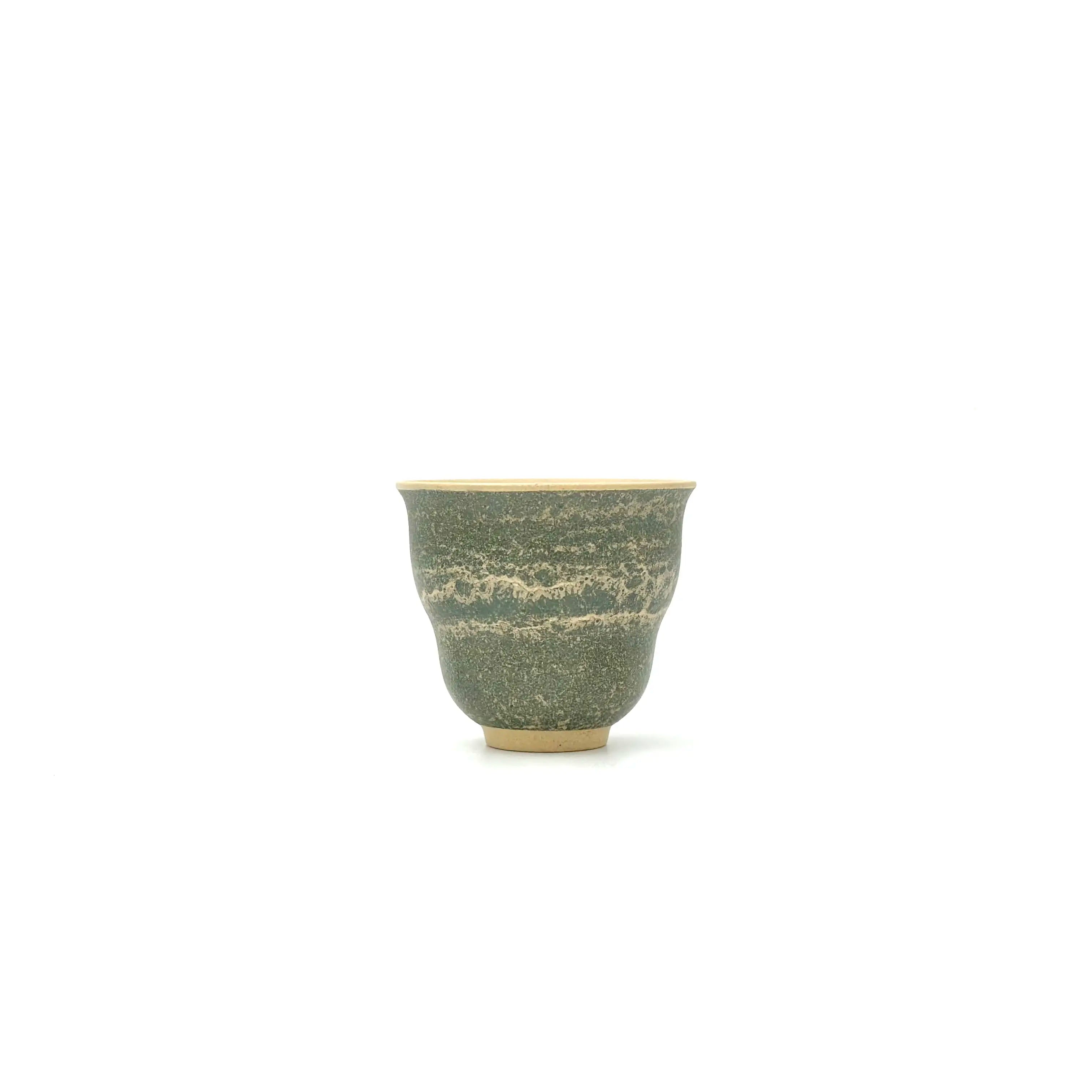 Front view of the 50ml Glazara Verdant Orchid teacup, featuring the handpainted Moss Dust pattern with fine, speckled glaze details.
