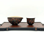 A curated Gongfu tea set featuring the Glazara Vintage Flora Urushi Gongdao Bei and matching porcelain teacup, displayed on a bamboo tray for modern tea connoisseurs.