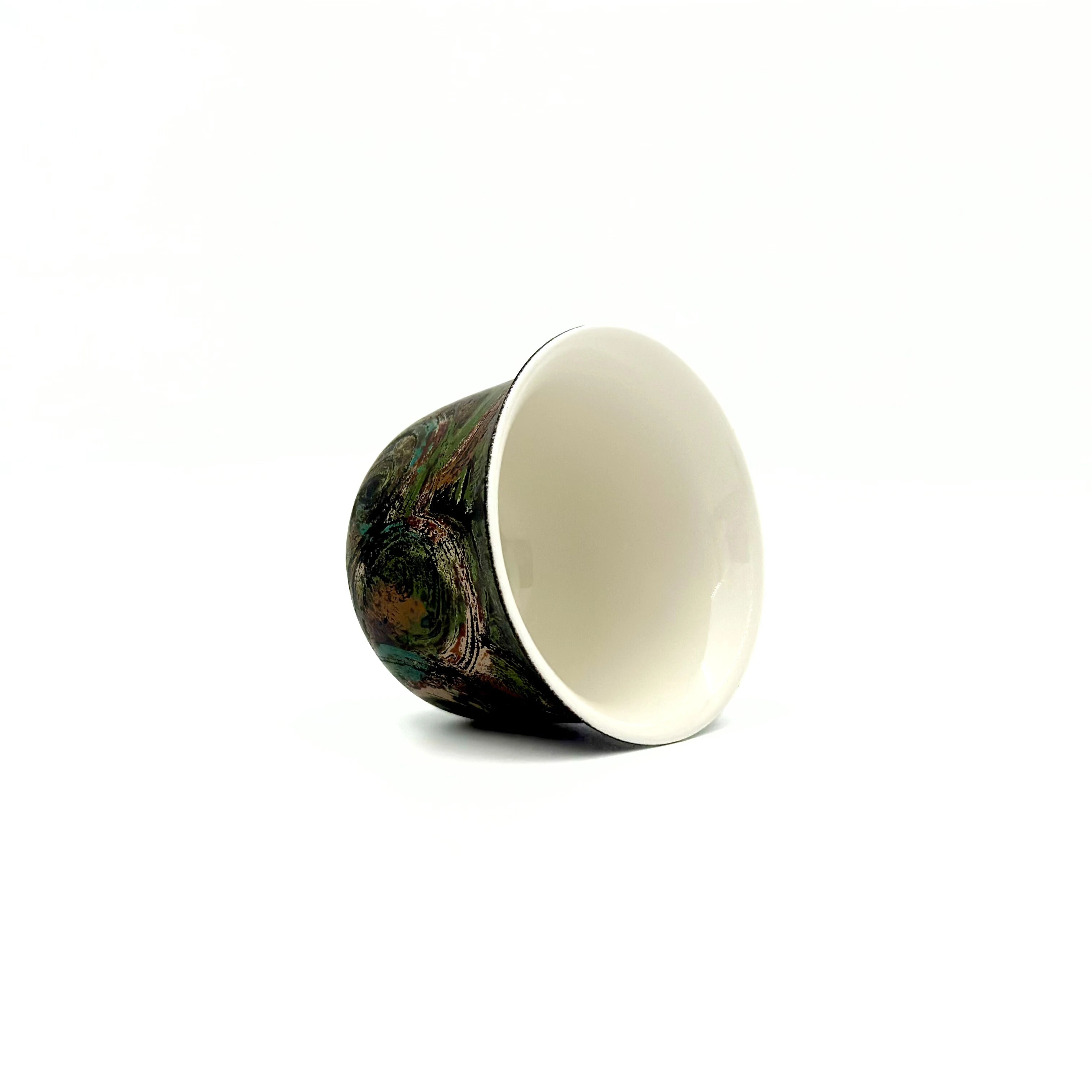 Overhead view showing the pristine interior of the 70ml Glazara Viridian Twilight porcelain Gongfu teacup, perfect for traditional and modern tea rituals.