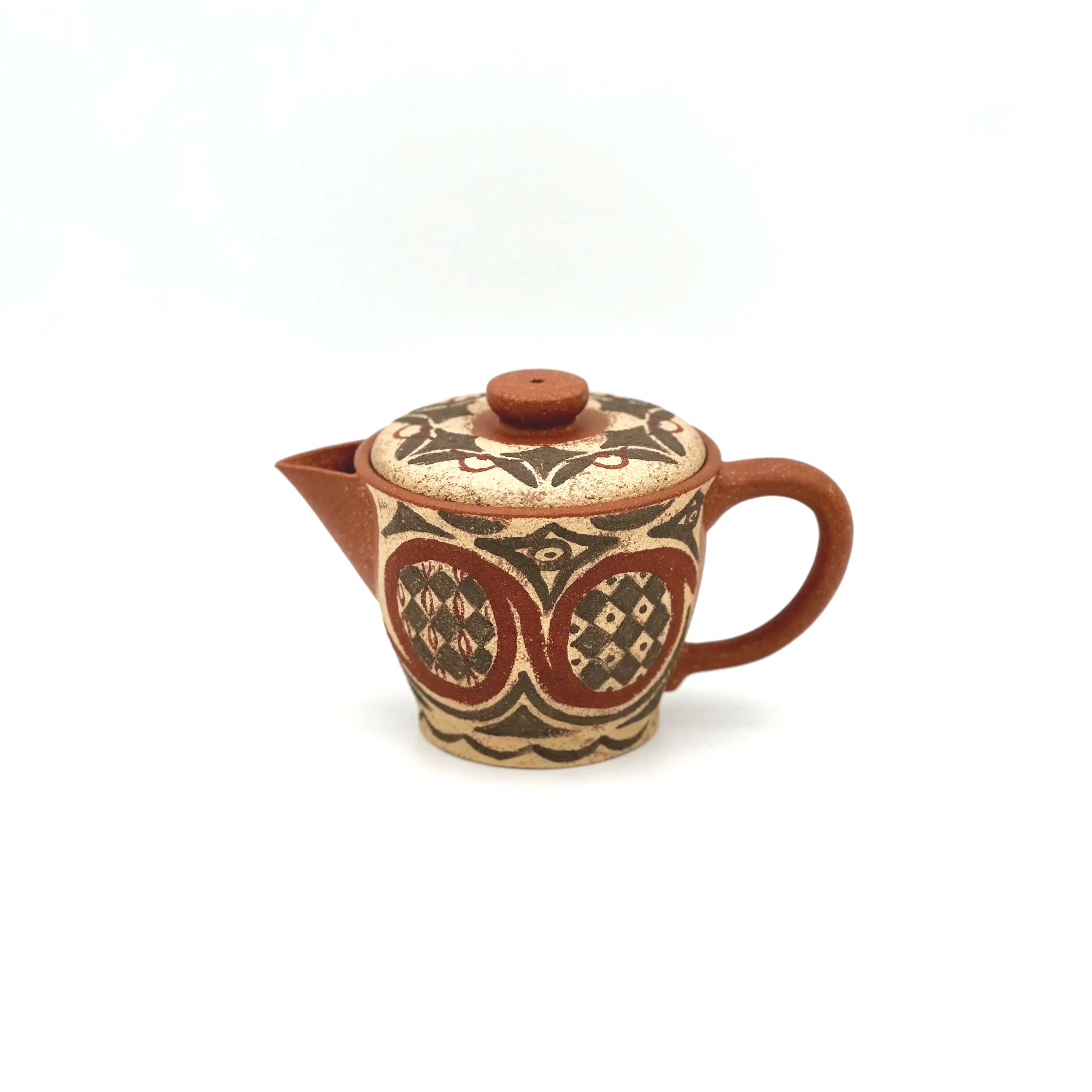 Front view of the Ivory Canvas white-slip painted Yixing Zisha teapot, showcasing its elegant curves and ancient Neolithic motifs.