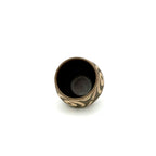High-angle view looking into the Ivory Canvas Yixing Zisha teacup, highlighting the smooth, glazed interior designed to perfectly hold the tea flavor.