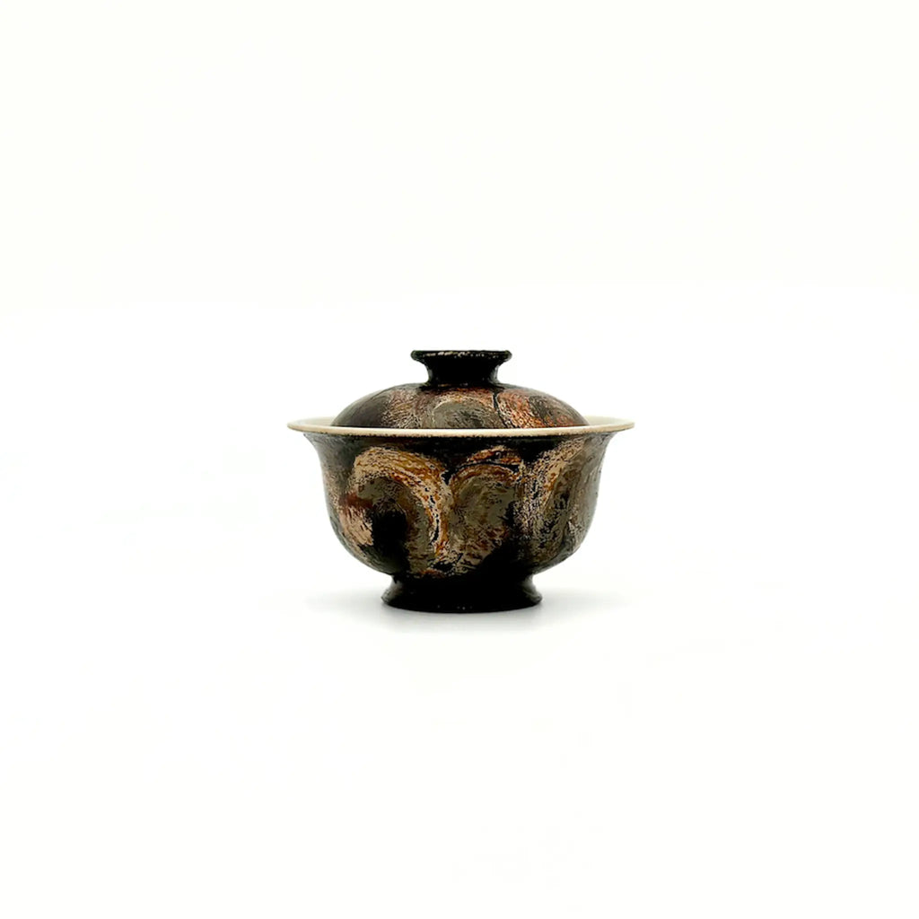 Ceramic gaiwan on a white background