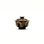 Ceramic gaiwan on a white background