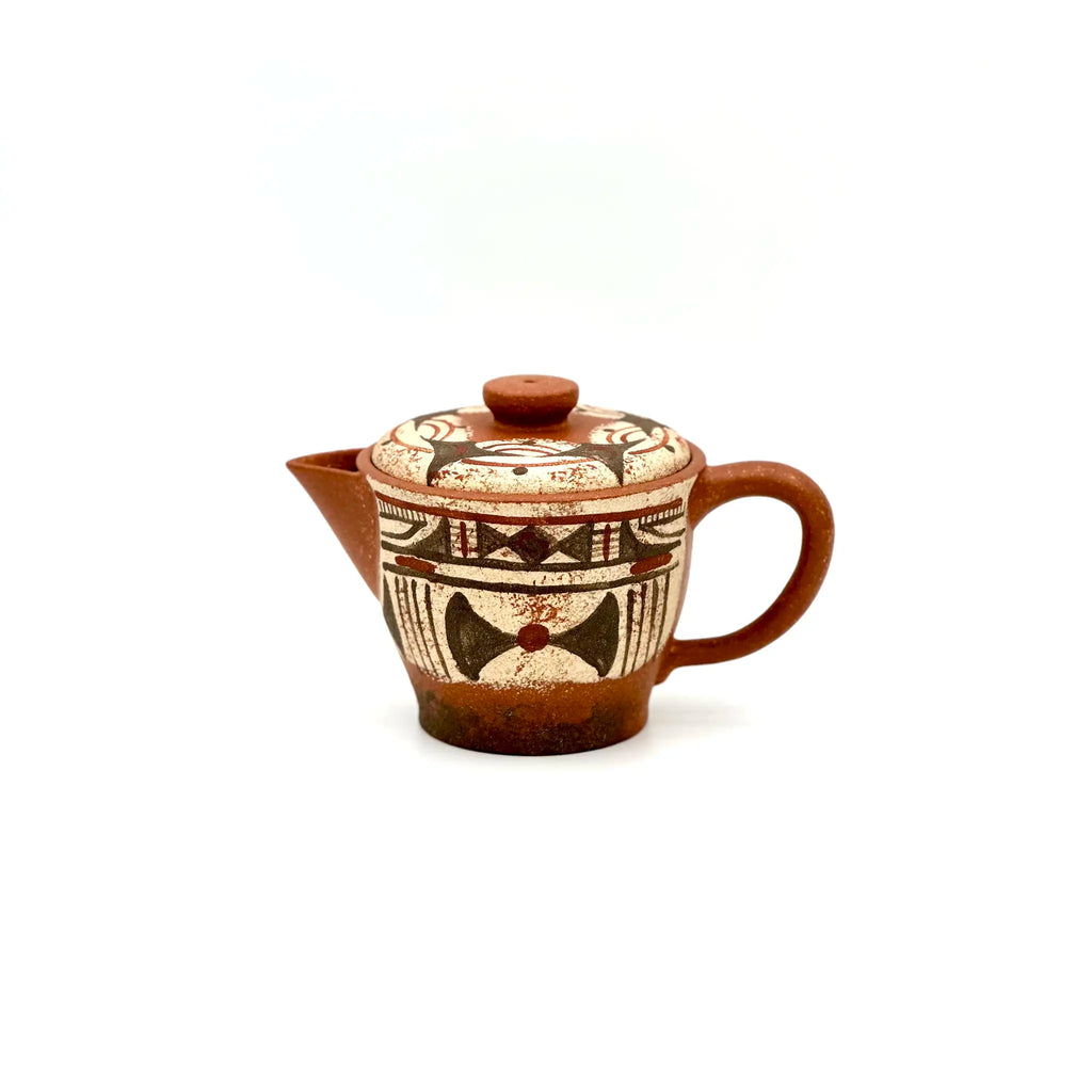 The unpainted base of the Neolithic Echo Yixing teapot, showcasing the authentic artisan's carved signature stamp against the natural Zisha clay.