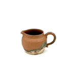 Front portrait view of the 130ml Nine-Colored Deer hand-painted Yixing Fairness Cup, highlighting the beautifully textured, rough surface of the authentic Zisha clay.